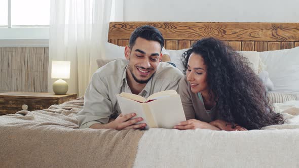 Ethnic Spanish Couple Beautiful Young Brunette Woman with Curly Hair and Bearded Handsome Spaniard