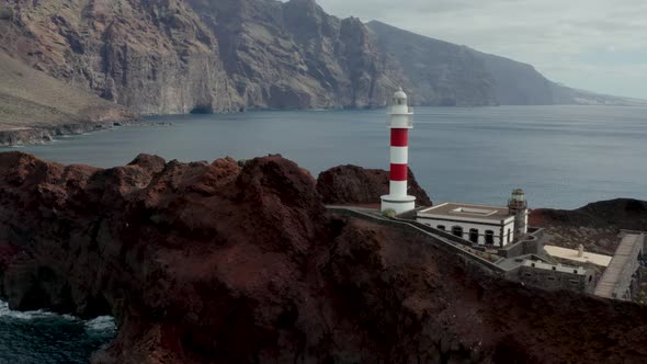 Aerial survey above the roads in Tenerife, Canary islands, lighthouse Teno