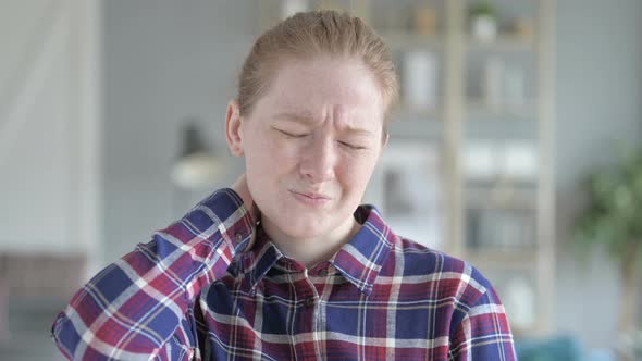 Close Up of Young Woman Having Neck Pain