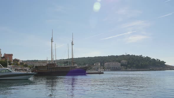 Pan right view of the seaport with ships