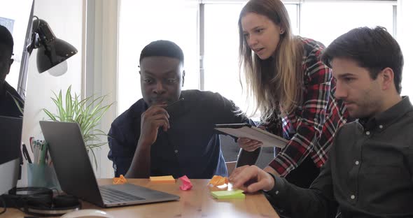 Happy employee people working together at startup office