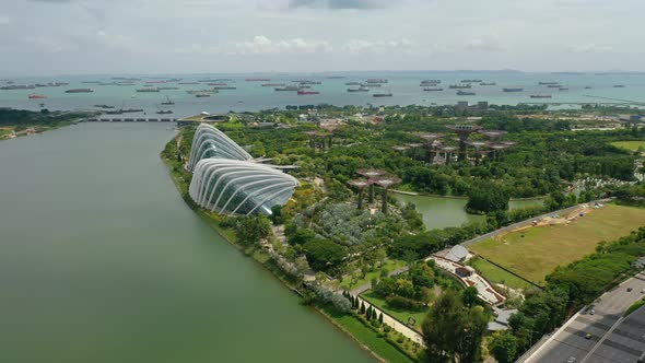 Gardens By The Bay, Flying Towards Skyline Singapore. Marina Bay In Singapore.