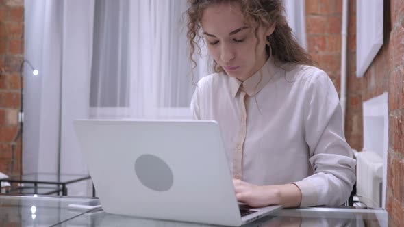 Working Female Leaving Office Sitting on Chair