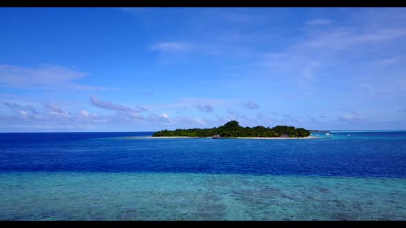 Aerial scenery of relaxing tourist beach journey by shallow sea and bright sandy background of adven