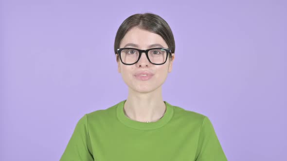 Cheerful Woman Smiling at Camera on Pink Background