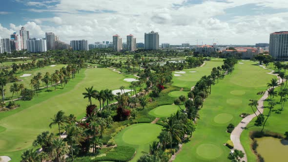 Cinematic Overhead View on Beautiful Golf Course on a Sunny Summer Day. Aerial 