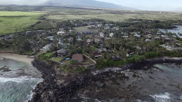 Zoom out aerial view of the Paia region, on the Maui Island of Hawaii, in the United States.