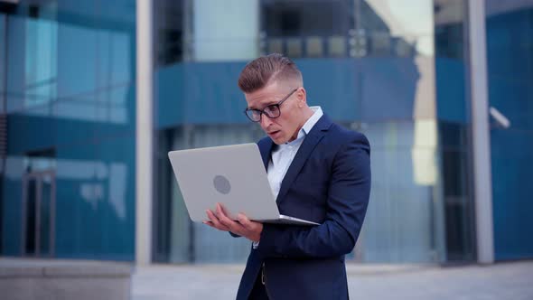 Business Businessman Celebrating Success Using Laptop Excited Caucasian Male Business Person Win