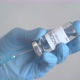 Doctor draws coronavirus vaccine into a syringe. - VideoHive Item for Sale