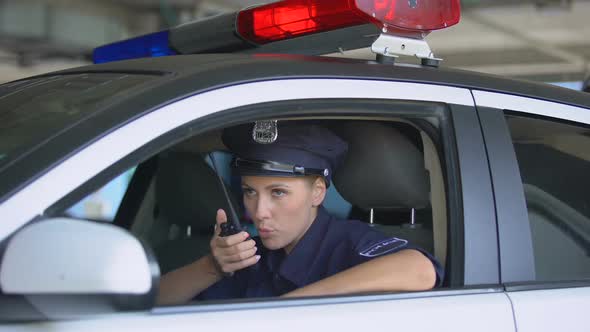 Female Cop Talking on Walkie-Talkie, Responding Emergency Call, Crime Prevention