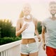 Attractive Man and Beautiful Woman Jogging Together - VideoHive Item for Sale