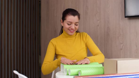 Girl at Home Fiddling with Gifts