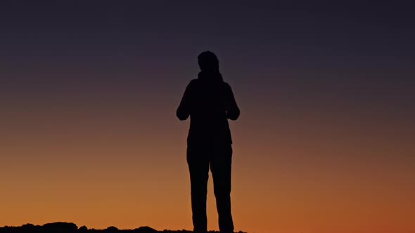 Human Silhouette on Sky Background