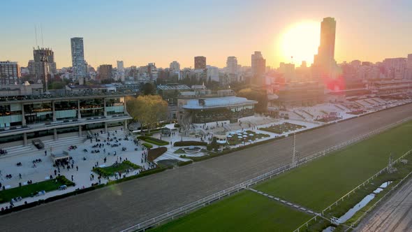 Aerial pan of horse race track Hipódromo Palermo, Buenos Aires, sunset