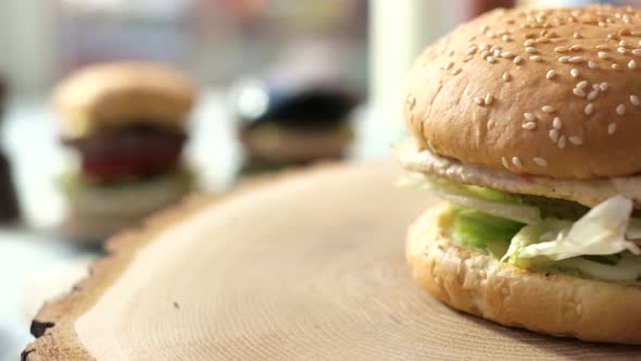 Burger on a Wood Board.