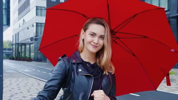Coquette Young Woman with Red Umbrella Smiling