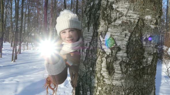 Happy Teenager Girl Playing In Winter Park, Kid Lets The Sunlight Spot