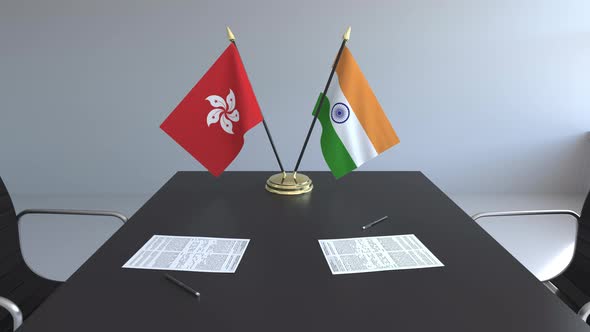 Flags of Hong Kong and India and Papers