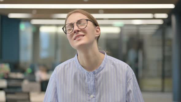 Portrait of Disappointed Young Woman Reacting to Loss