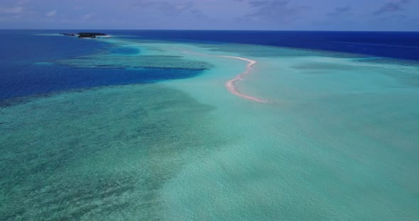 Wide angle aerial copy space shot of a sunshine white sandy paradise beach and blue sea background i