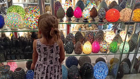 Little Girl in the Souvenir Market