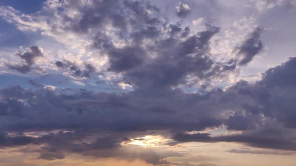 Epic Sunset Over The Sea Shore With Clouds. Dark Sunset. Orange Blue Sunset After Rain