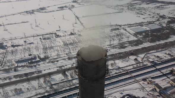 Aerial View of High Chimney Pipes with Grey Smoke From Coal Power Plant