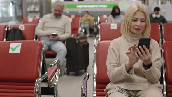 Caucasian Woman In Departure Lounge