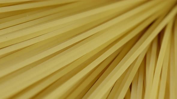 Raw Rye Spaghetti Texture Background. Close Up . Italian Spaghetti Raw Food Background Texture.