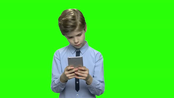 Child Kid Boy Texting Message on His Phone