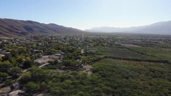 Aerial View Of A Town Near Mountains And Nature