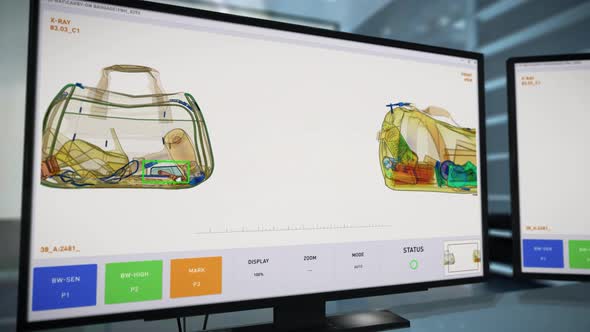 An Airport Security System has Found the Knife in the Baggage of the Passenger alt