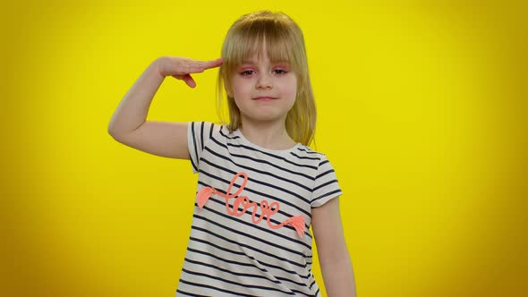 Responsible Teen Child Kid Girl Giving Salute Listening to Order As If Soldier Following Discipline
