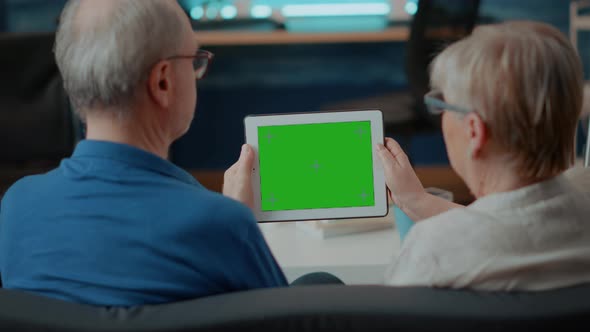 Senior People Holding Digital Tablet with Green Screen