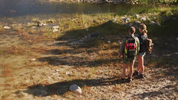 Caucasian couple hiking in nature