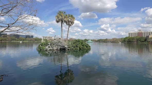 Palm trees on an isle in the middle of a lake