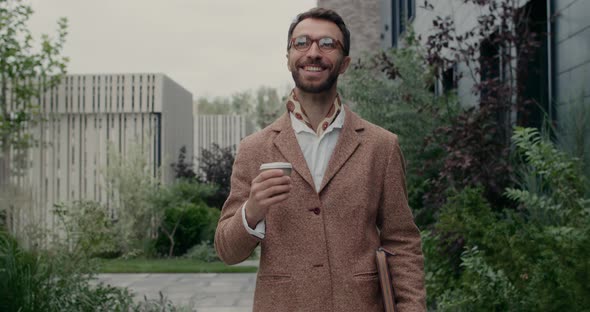 Crop View Handsome Man Glasses Carrying Leather Paper Folder Coffee Paper Cup