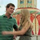 Teenage couple at fun fair, girl dragging boyfriend away - VideoHive Item for Sale