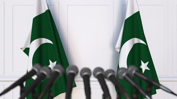 Pakistani Official Press Conference with Flags alt