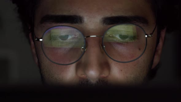 Young Brunette Man Eyes Closeup Computer Screen Reflection in Circle Glasses