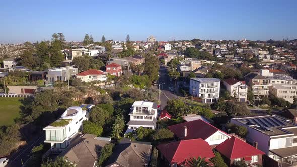 Aerial view of residential houses at spring. Establishing shot of Australian neighborhood, suburb. R