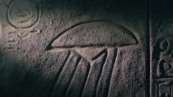 Torch Shines On UFO Ancient Rock Carving