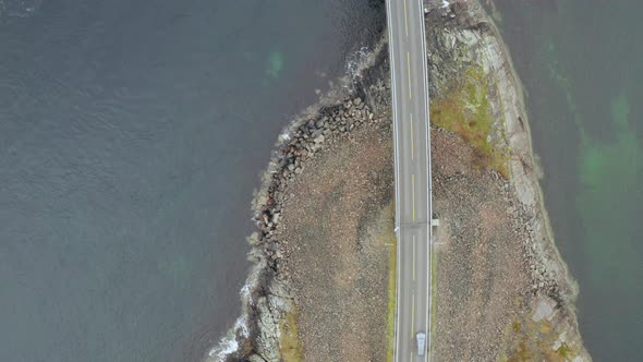 Car Driving On Storeseisund Bridge In More and Romsdal County On Atlantic Ocean Road, Norway. - Bird