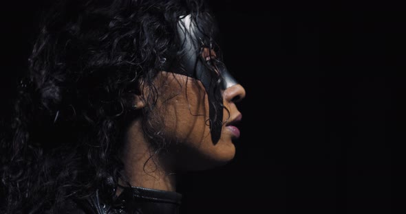 Profile Footage of a Beautiful Black Woman in a Mask Superhero Cosplay