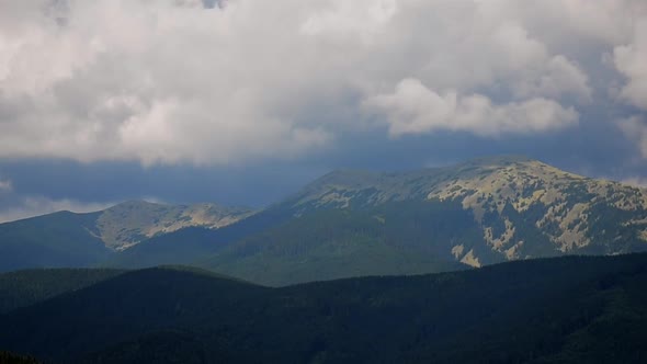 Timelapse Mountain Landscape with Moving Clouds