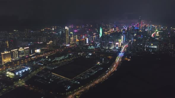 Shenzhen City at Night. Futian District and Shenzhen Bay. China. Aerial View