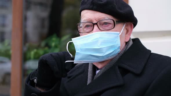 Grandpa Takes Off His Protective Mask and Smiles