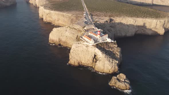 Aerial scenic view of Cabo de Sao Vicente headland, cliffs and the lighthouse, in Sagres