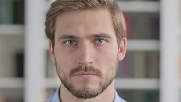 Close Up of Face of Man Looking at the Camera