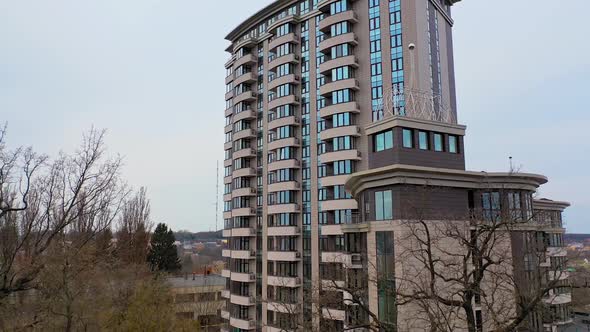 New multi-storey building in the city outside. Beautiful modern high-rise